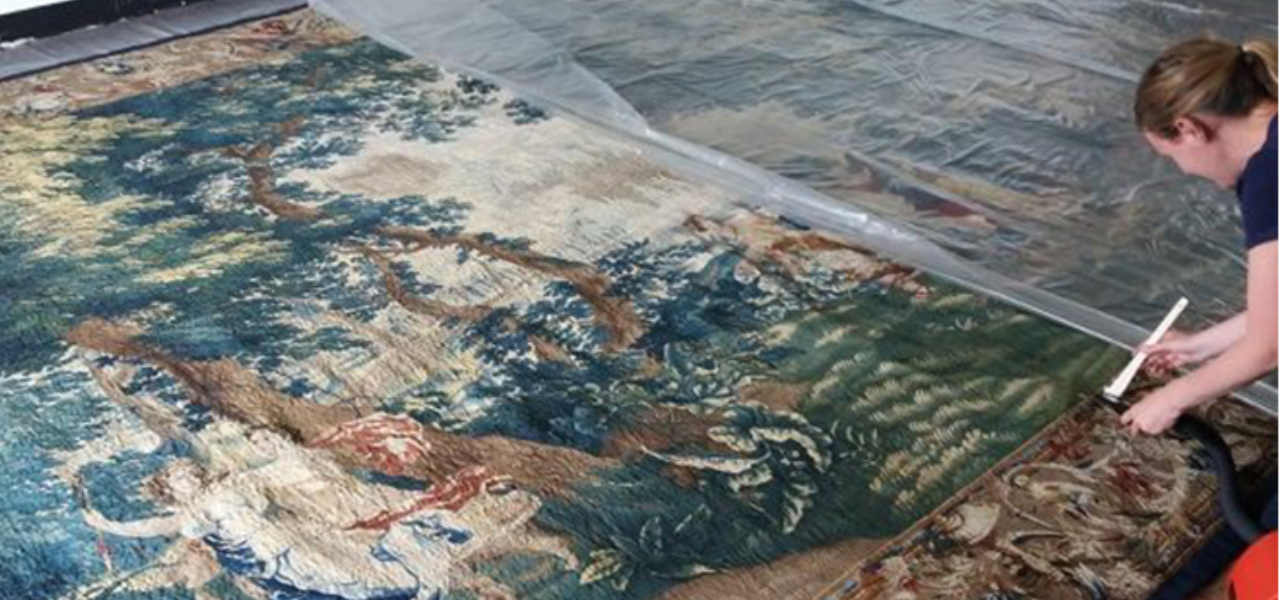 Cleaning a 17th century tapestry conservation work