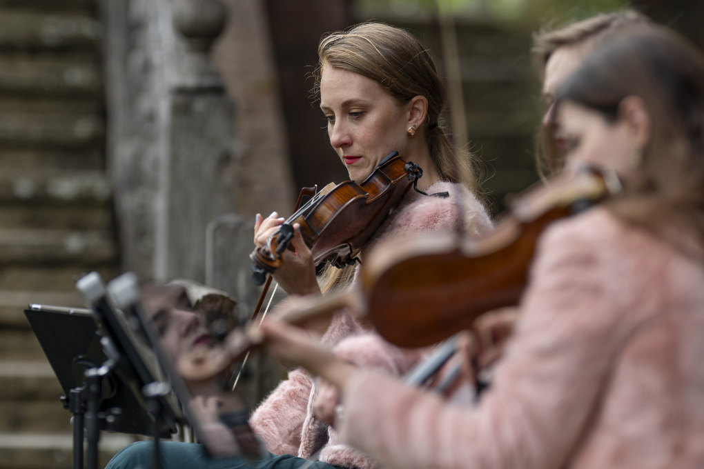 music and weddings - a string quartet playing outside