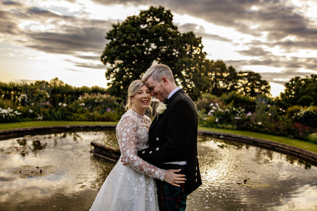 A happy wedding couple at Hatfield Park - wedding photography styles - Photograph courtesy of Rafe Abrook Wedding Photography