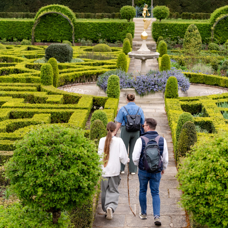 Visitors enjoying the Knot Garden at Hatfield House and Park.